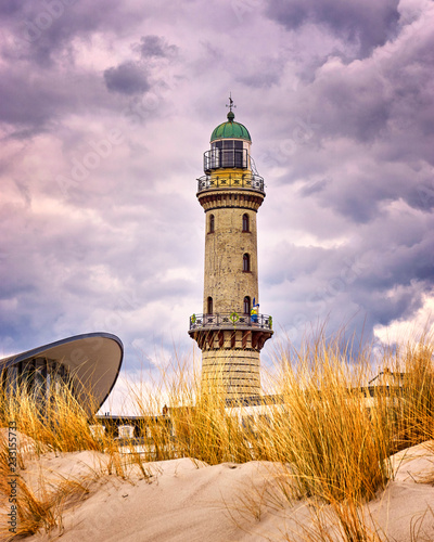 Lighthouse at the Teepott between the dunes in Warnemünde.