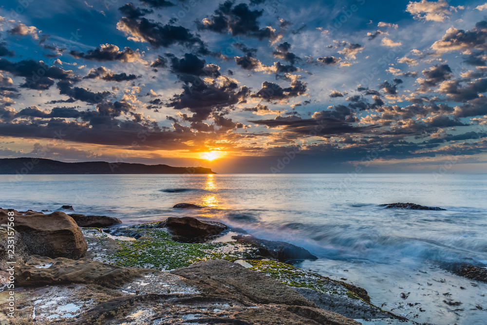 Fototapeta premium Sunrise Seascape with Clouds