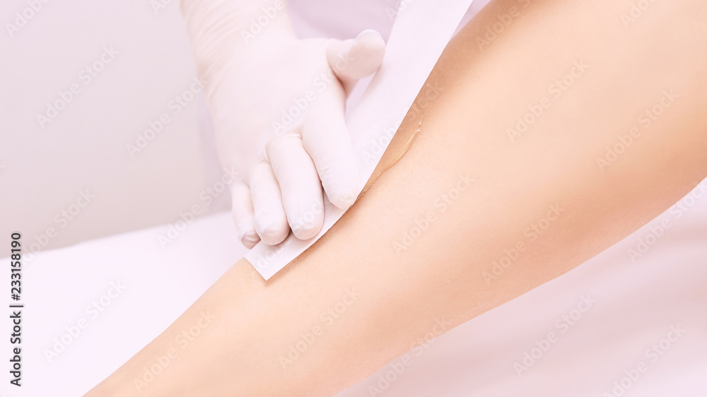 Depilation spa procedure. Woman hair remove waxing. Epilation sugaring. Legs foot Depilation spa procedure. Woman hair remove waxing. Epilation sugaring. Legs foot