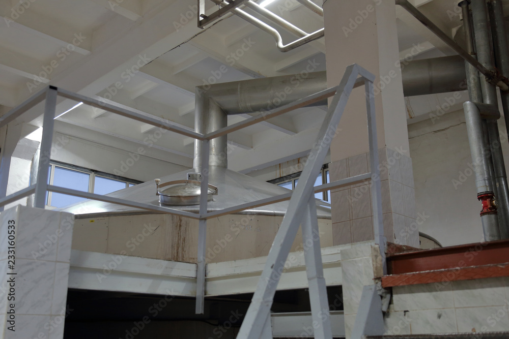 Obraz premium Equipment, industrial tools and machinery for the production of beer in factory shops