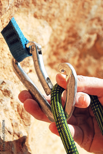 A climbers rope and quick-draws. Climbing concept sport