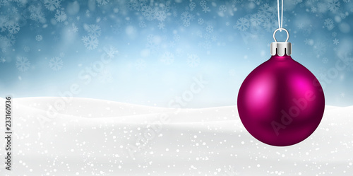Blue Christmas and New Year background with pink Christmas ball.