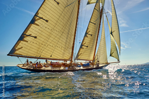 Sports team of yachtsmen is fighting to win the regatta. Sailing yacht race. Yachting photo