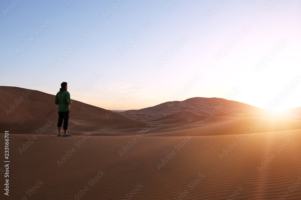 Hinking in the sand dunes in the Sahara Desert. Morocco, Africa