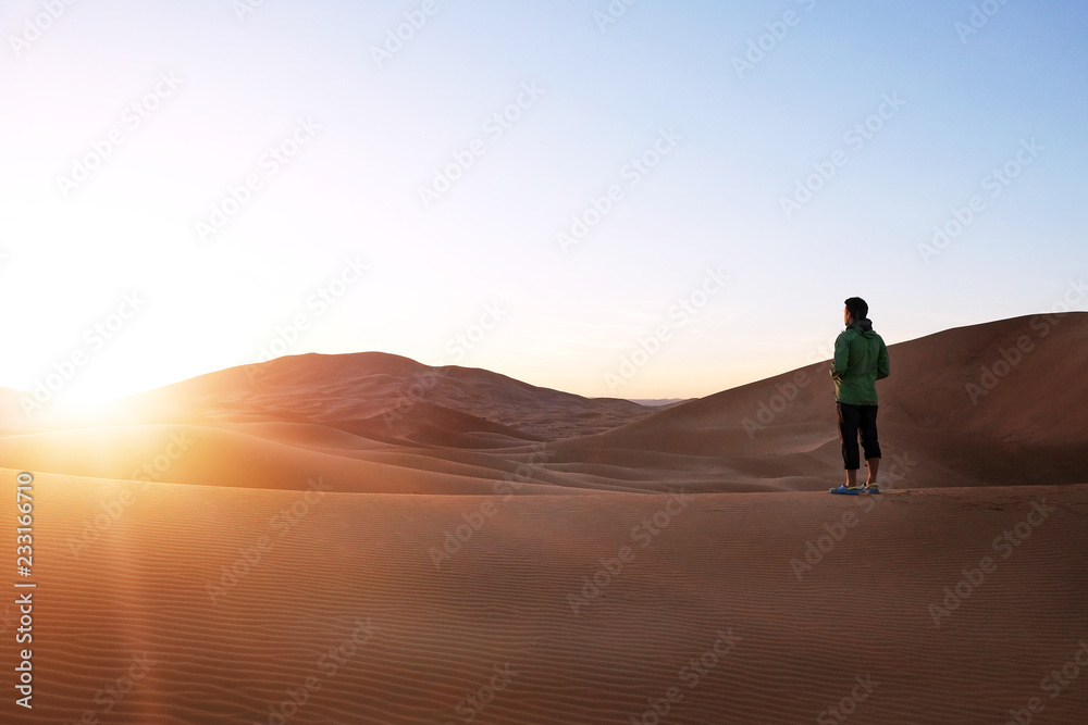 Hinking in the sand dunes in the Sahara Desert. Morocco, Africa