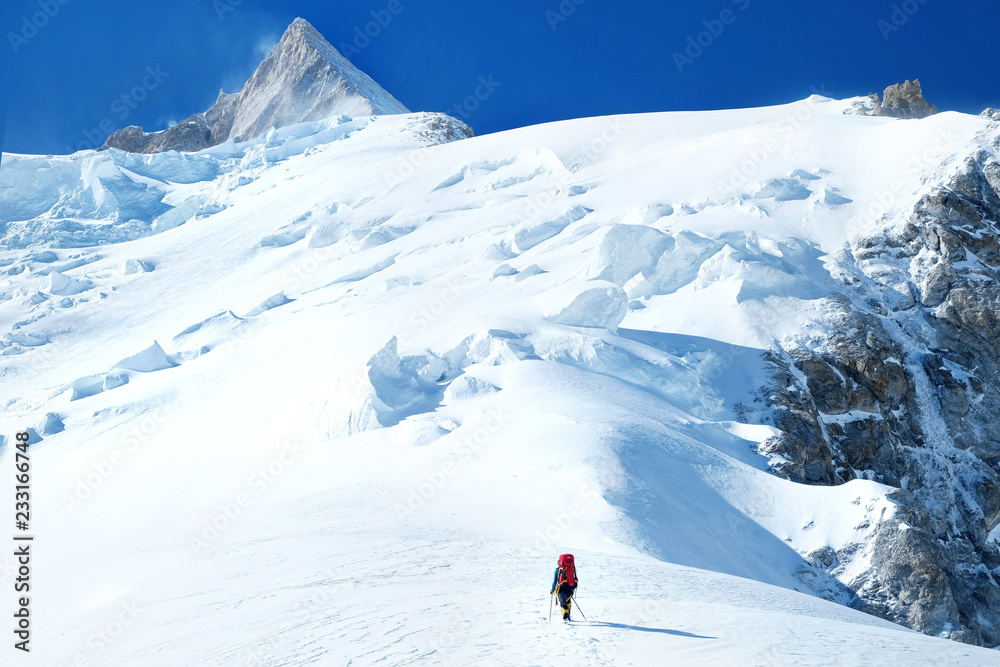 Climber  reaches the summit of Everest. Mountain peak Everest. Highest mountain in the world. National Park, Nepal .
