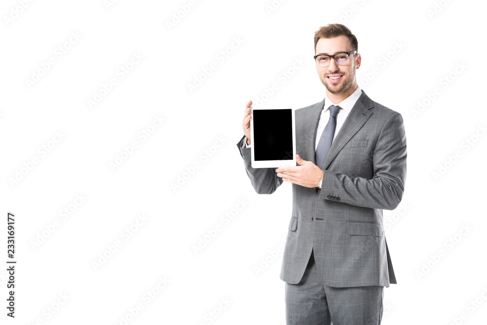 adult smiling businessman holding digital tablet with blank screen isolated on white