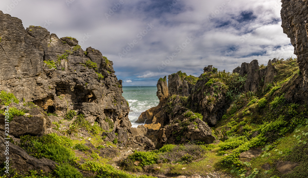 Punakaiki Pancake Rocks with blowholes in the Paparoa National Park, New Zealand