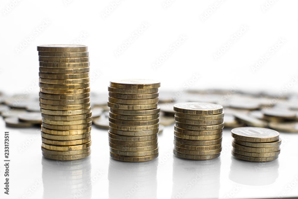 on a white background with a reflection of a lot of scattered coins and a column on a white background with a reflection of a lot of scattered coins and a column