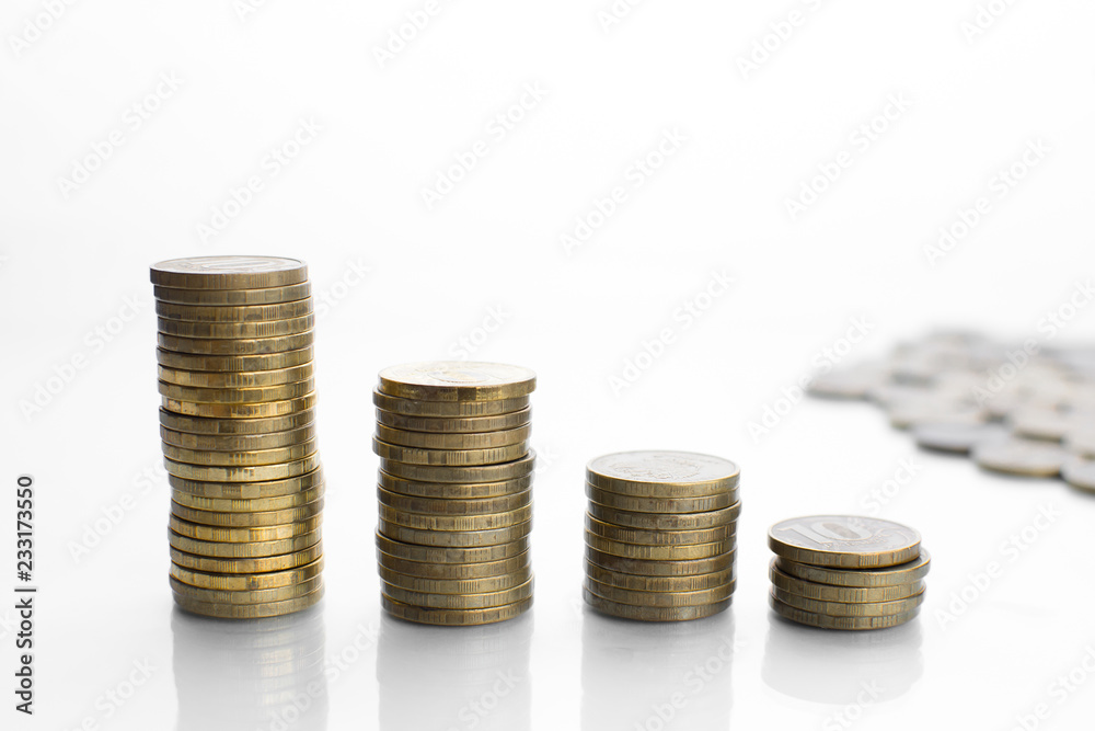 on a white background with a reflection of a lot of scattered coins and a column on a white background with a reflection of a lot of scattered coins and a column