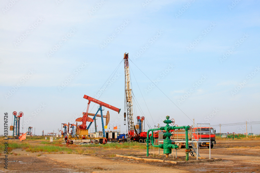 oil drilling operation scene in the JiDong oilfield, China. oil drilling operation scene in the JiDong oilfield, China.
