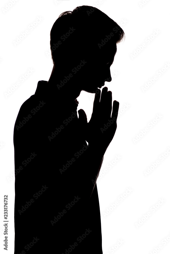 black and white silhouette portrait of an unrecognizable man thinking, face profile on a white isolated background