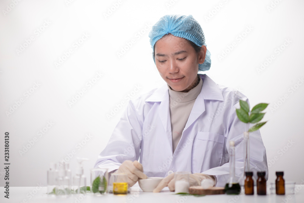 Scientist hand holding green leaf in glass cuvette on laboratory. biotechnology concept. Scientist hand holding green leaf in glass cuvette on laboratory. biotechnology concept.