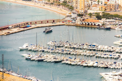 Aerial view of Javea harbor in Spain, from the cape of San Antonio on a cloudy day photo