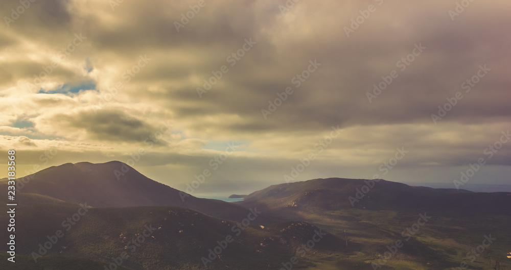 sun shining through the clouds at Mount Oberon Summit at sunset, Wilsons Promontory National park