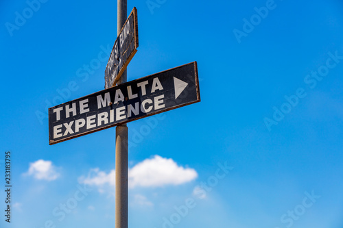 Schild - Malta Experience