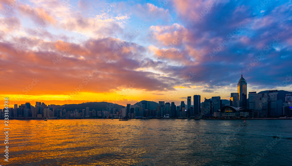 sunrise sky background over Victoria bay in Hong kong.