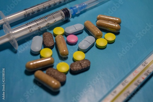 pills on blue background