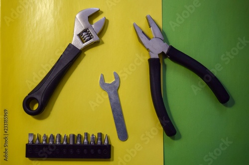 set of tools isolated on yellow background