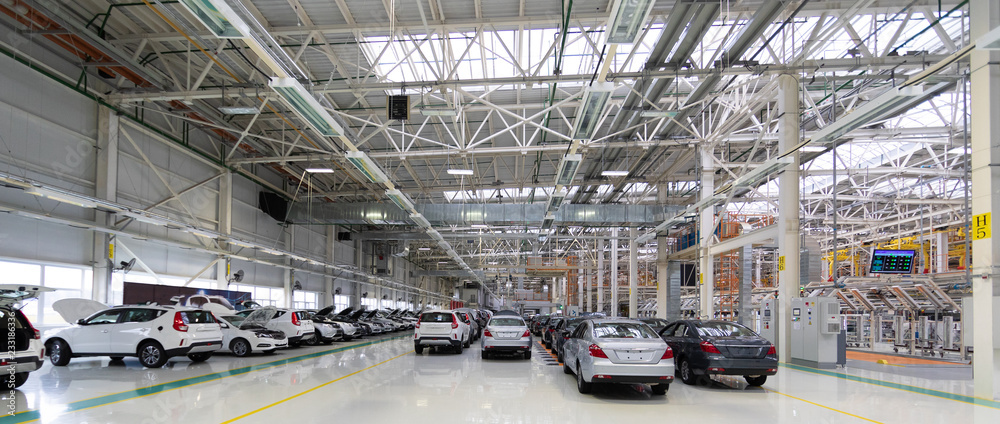 new car is at factory. Warehouse of cars. Modern car Assembly at factory