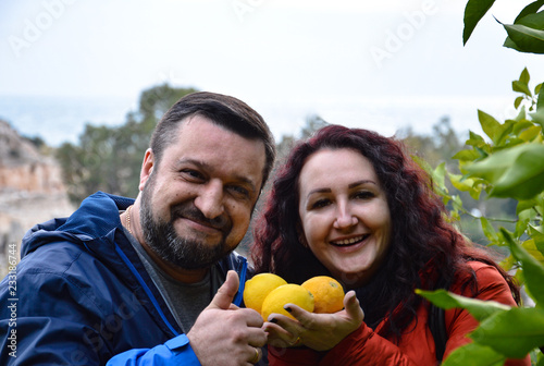 Happy couple with lemons