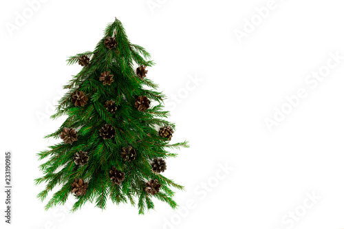 Christmas tree made of fir branches and pine cones isolated on white Holiday concept. Flat lay  top view