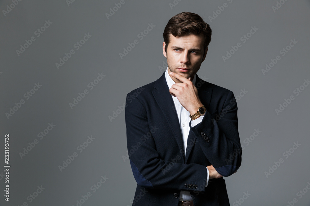 Close up portrait of a pensive young businessman