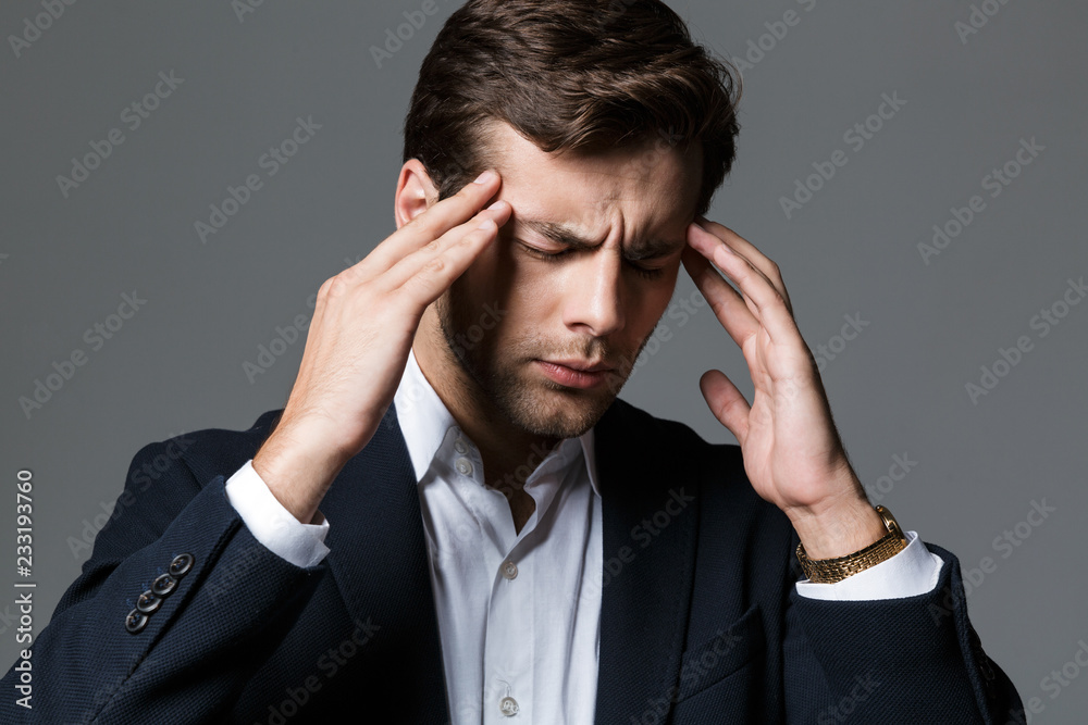 Close up portrait of a exhausted young businessman Close up portrait of a exhausted young businessman