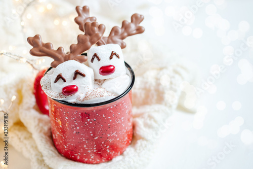 Hot chocolate with melted marshmallow reindeer