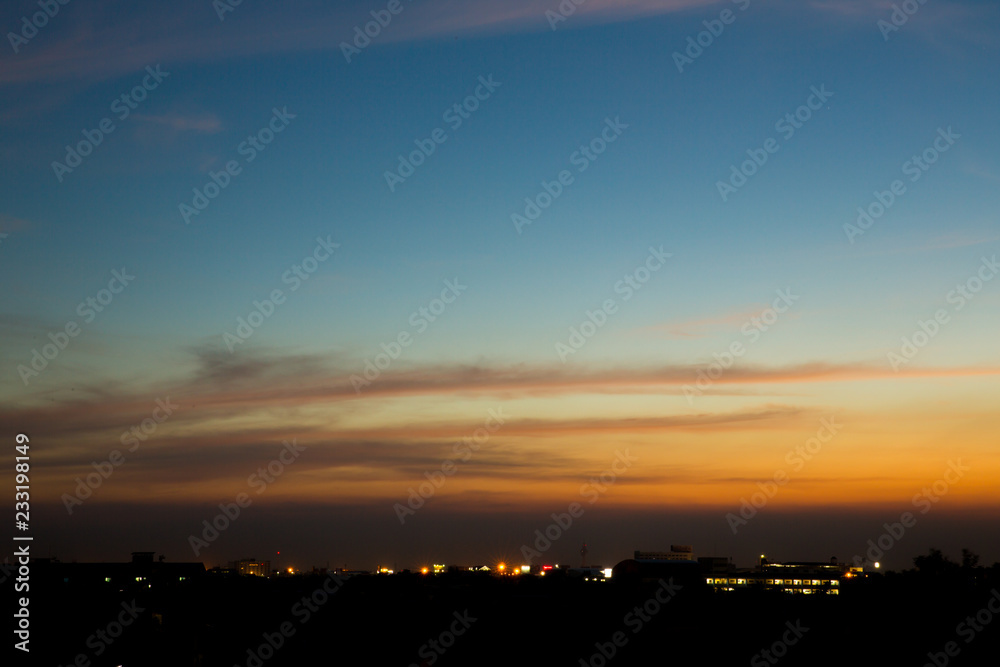 Twilight sky background. Colorful Sunset sky and cloud.vivid sky in twilight time background.Fiery orange sunset sky. Beautiful