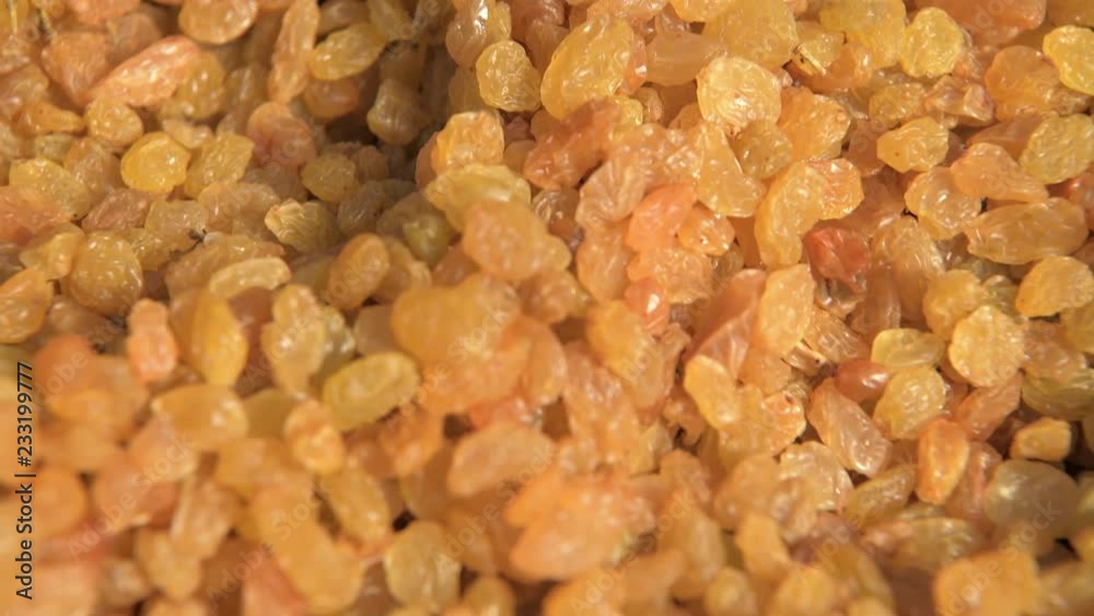 Yellow delicious sweet raisins close up