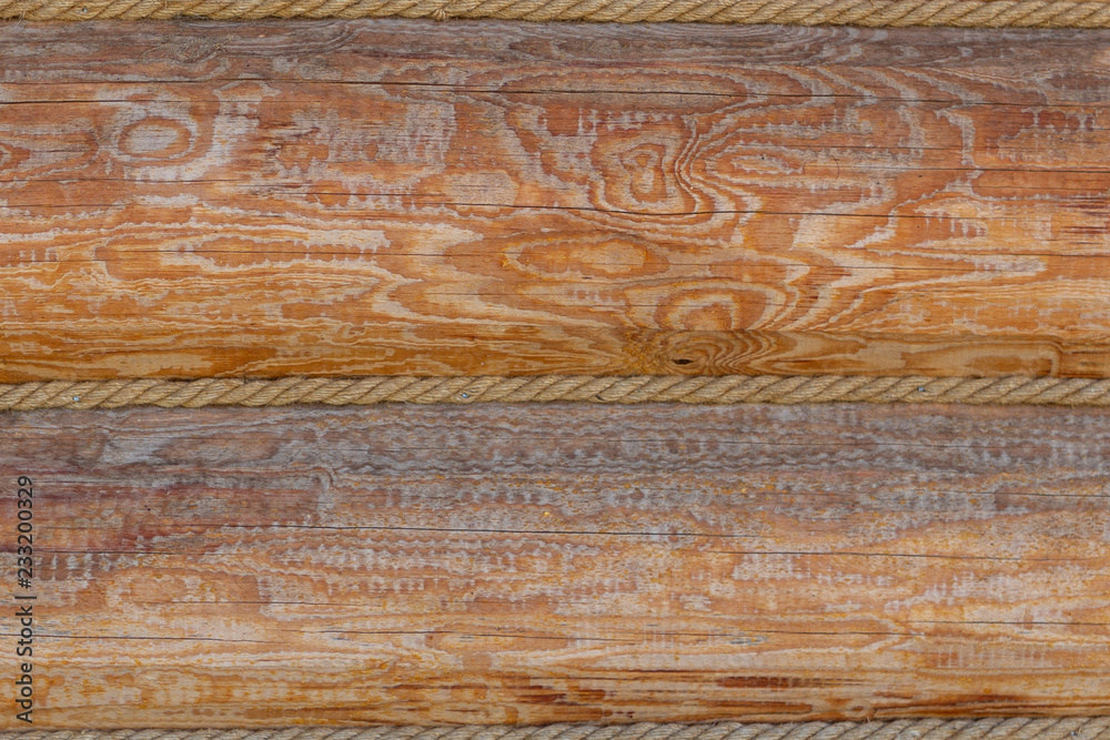 Fototapeta premium Shield with a large number of parallel wooden logs