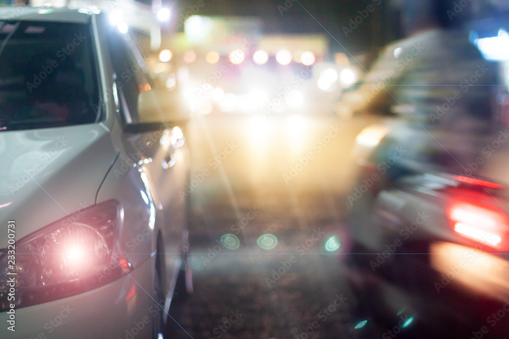Abstract blur image of Cars on the road at night,The car ran to the park. Abstract blur image of Cars on the road at night,The car ran to the park.