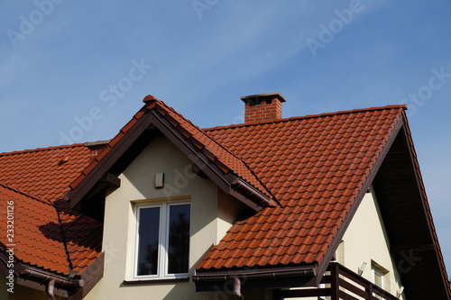 A newly built residential house, a roof made of ceramic tiles.