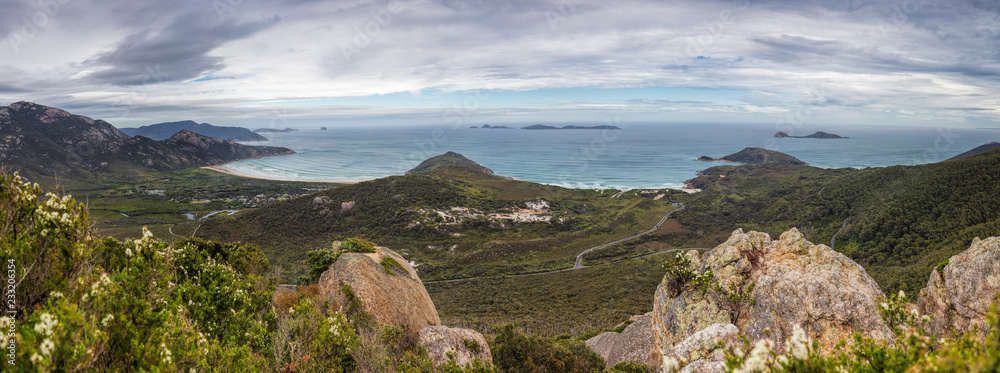 Looking out from the summit of Mount Bishop across the landscape and coastline around Tidal River in Wilsons Promontory national park, Victoria, Australia Looking out from the summit of Mount Bishop across the landscape and coastline around Tidal River in Wilsons Promontory national park, Victoria, Australia