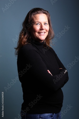 Woman in front of a colored background