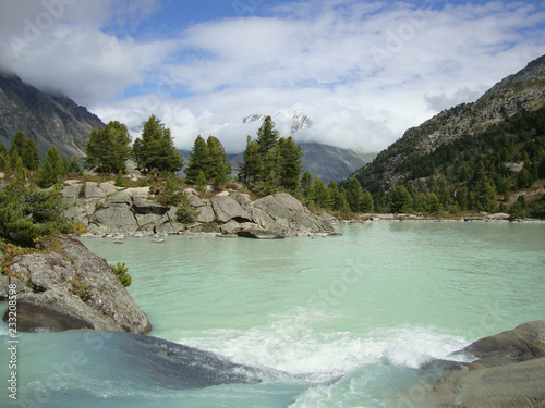 Turquoise mountain lake beautiful landscape in Altai 