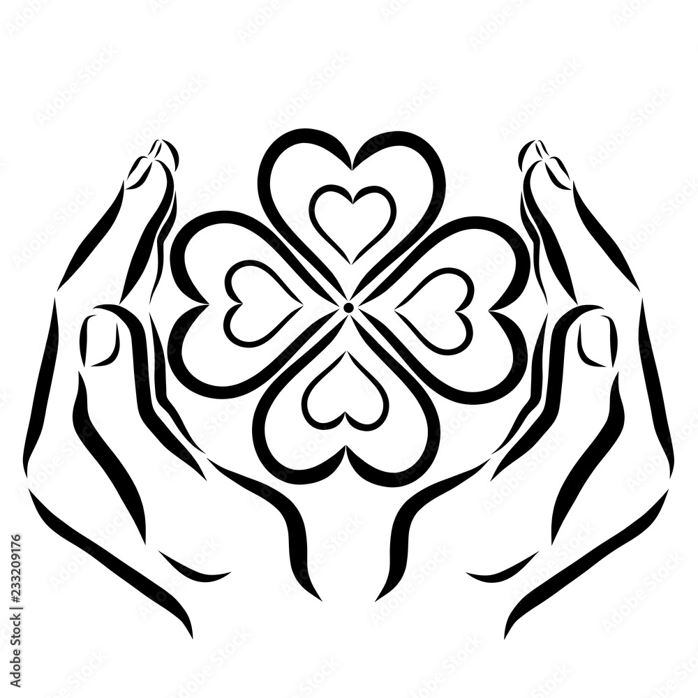 Clover with four leaves in the shape of hearts in the hands of a man Clover with four leaves in the shape of hearts in the hands of a man