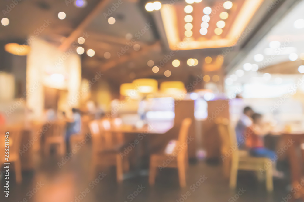 Restaurant interior with customer and wood table blur abstract background with bokeh light Restaurant interior with customer and wood table blur abstract background with bokeh light