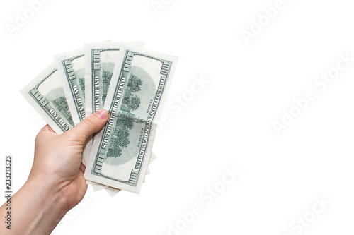 Hand holding money. Isolated object on white background.