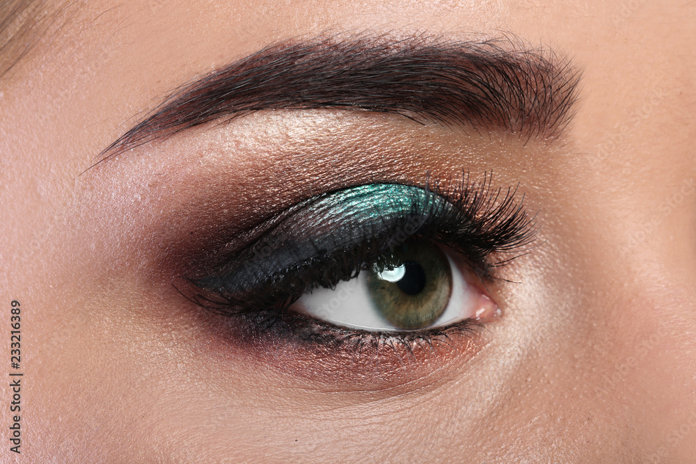 Fototapeta premium Young woman with eyelash extensions and beautiful makeup, closeup view