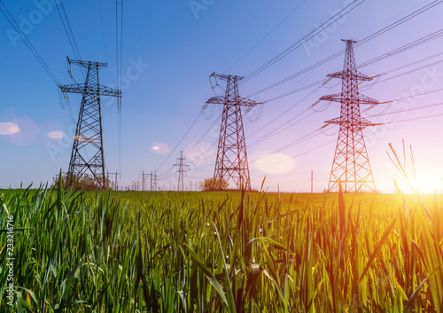 High-voltage power lines. Electricity distribution station. high voltage electric transmission tower. Distribution electric substation with power lines and transformers