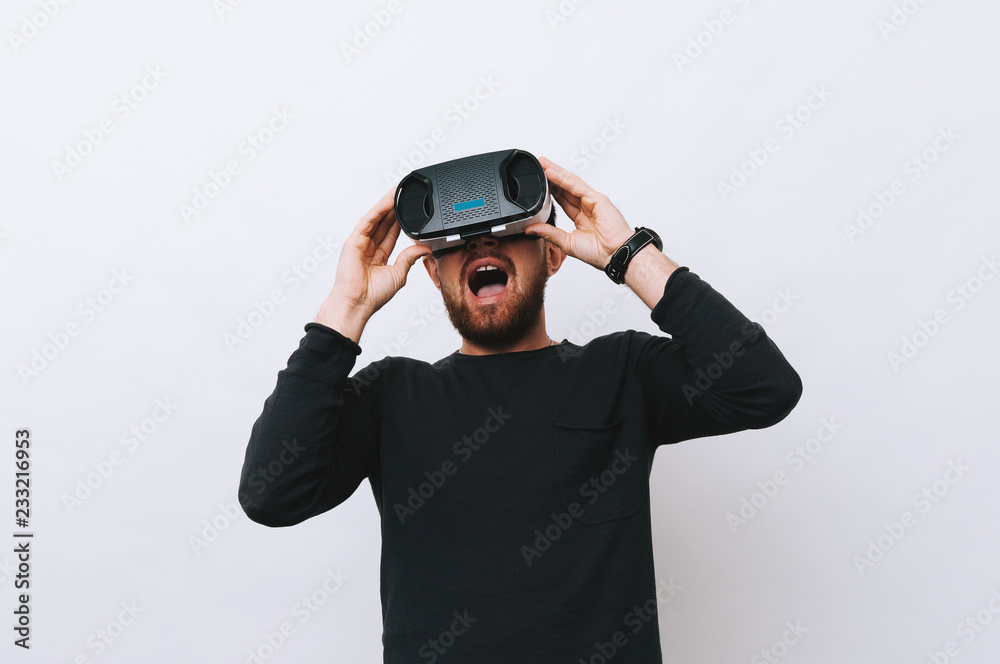 Amazed man having virtual reality experience Amazed man having virtual reality experience