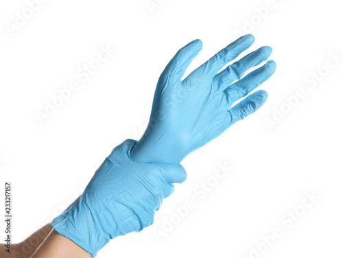 Fototapeta Naklejka Na Ścianę i Meble -  Doctor wearing medical gloves on white background