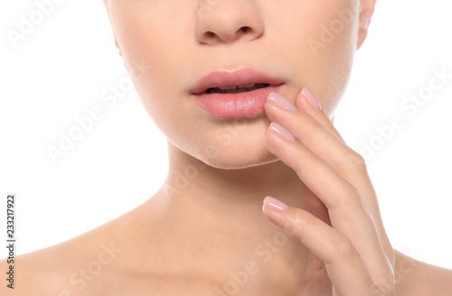 Closeup view of beautiful young woman on white background. Lips contouring  skin care and cosmetic surgery concept