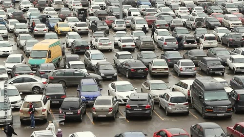 Lots of cars parking in the city