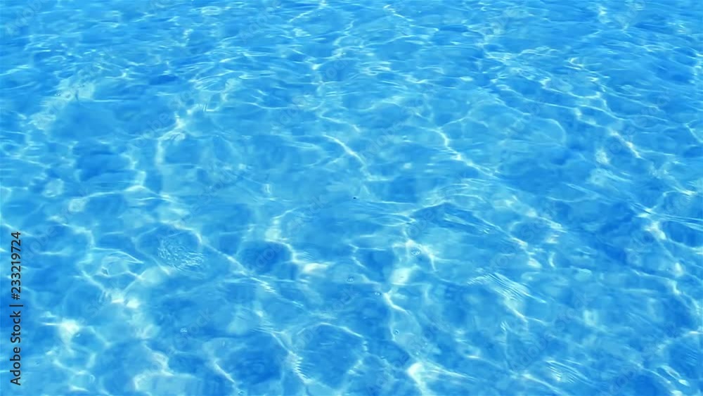 Beautiful refreshing blue swimming pool water Beautiful refreshing blue swimming pool water
