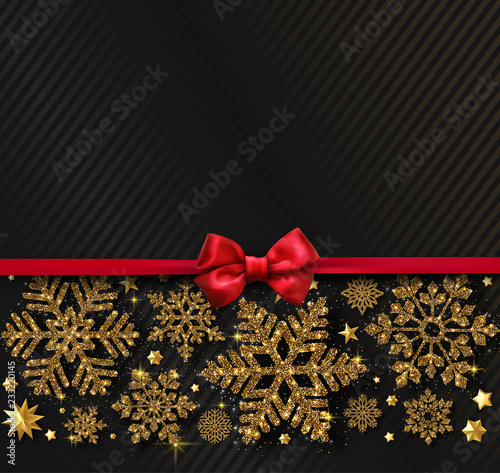 Christmas, New Year and winter background with golden snowflakes and satin bow.