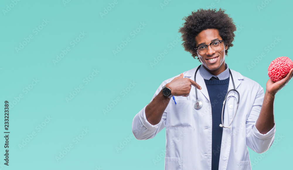 Afro american neurologist doctor or psychology man over isolated background with surprise face pointing finger to himself Afro american neurologist doctor or psychology man over isolated background with surprise face pointing finger to himself