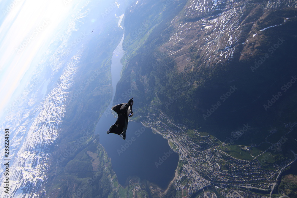 Fototapeta premium Wingsuit skydiving over Norway